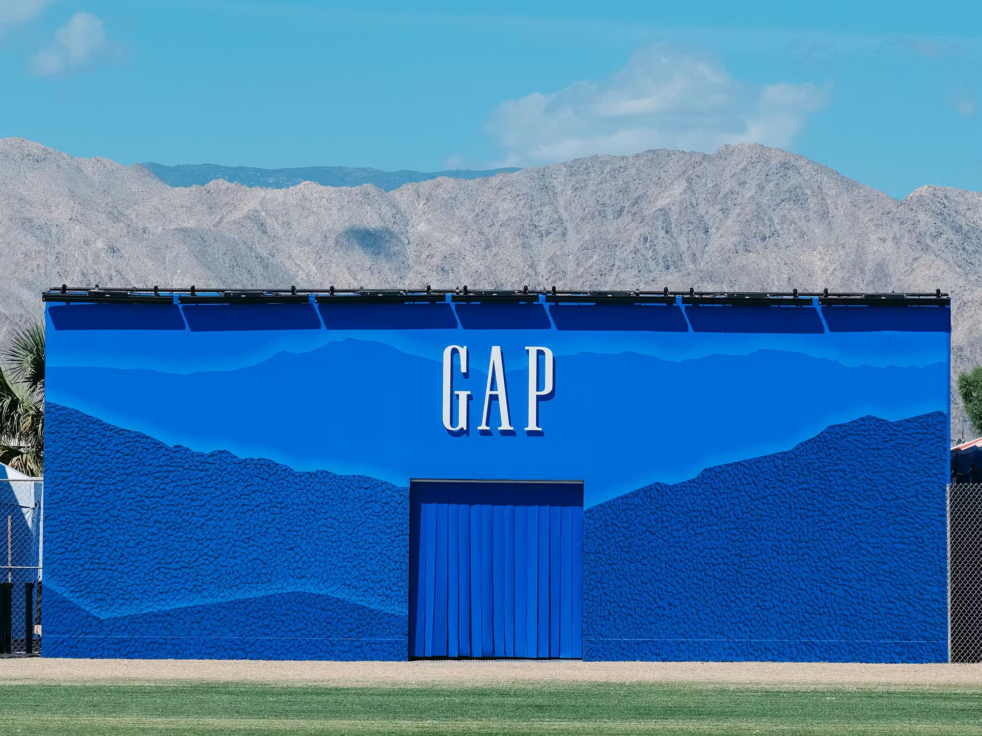 Exterior of the Gap Hoodie House at Coachella 2026, an oversized denim-blue pavilion.